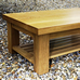 Coffee table in Oak with slatted shelf